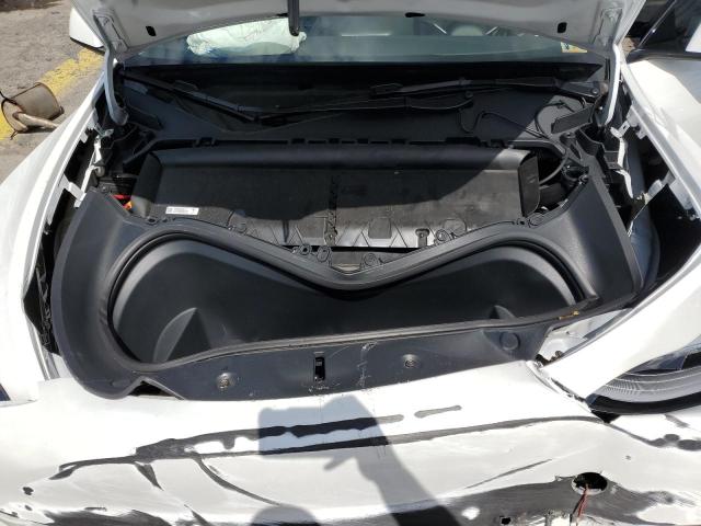 Photo 11 from auction – 2022 TESLA MODEL Y with VIN 7SAYGDEE9NF319290