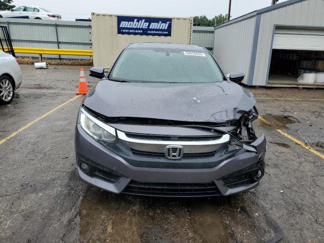 Photo 5 from auction – 2016 HONDA CIVIC EX with VIN 19XFC1F38GE009376