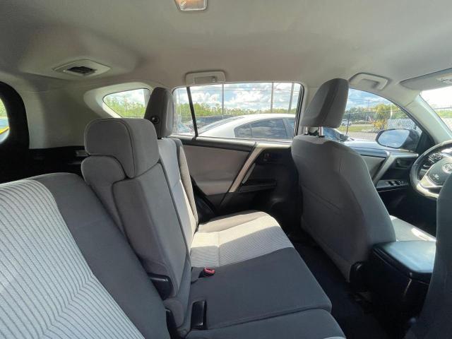 Photo 6 from auction – 2014 TOYOTA RAV4 LE with VIN JTMZFREV3EJ006620