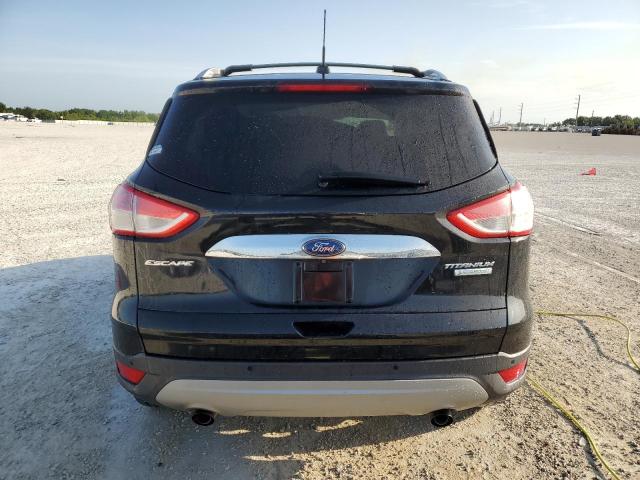 Foto 6 de la subasta – 2014 FORD ESCAPE TIT con VIN 1FMCU0J94EUE07488