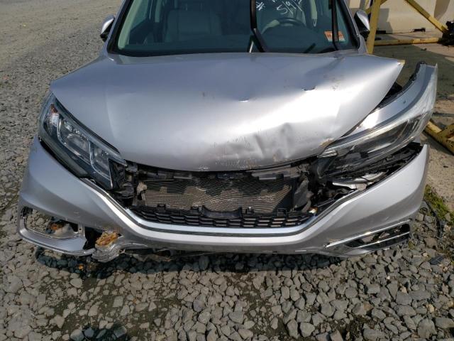 Photo 12 from auction – 2015 HONDA CR-V EXL with VIN 2HKRM4H77FH668121
