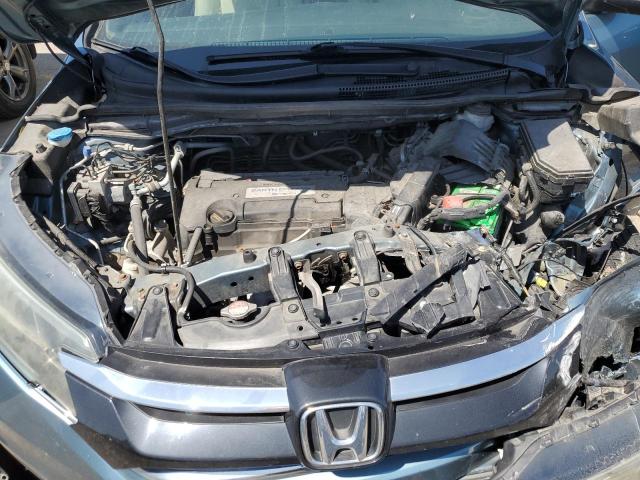 Photo 12 from auction – 2015 HONDA CR-V LX with VIN 5J6RM4H35FL038181