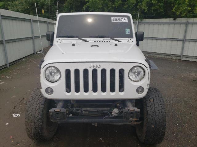 Photo 5 from auction – 2016 JEEP WRANGLER U with VIN 1C4BJWDG7GL301860