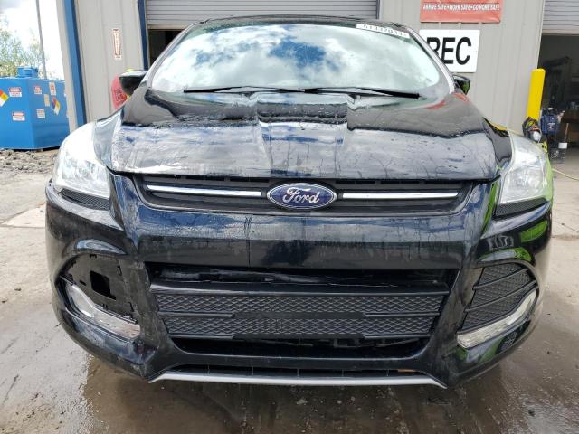 Photo 5 from auction – 2016 FORD ESCAPE SE with VIN 1FMCU9GX7GUB00331