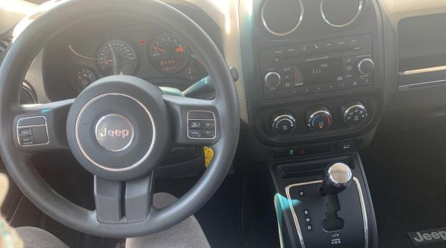 Photo 9 from auction – 2014 JEEP PATRIOT with VIN 1C4NJRAB7ED569015