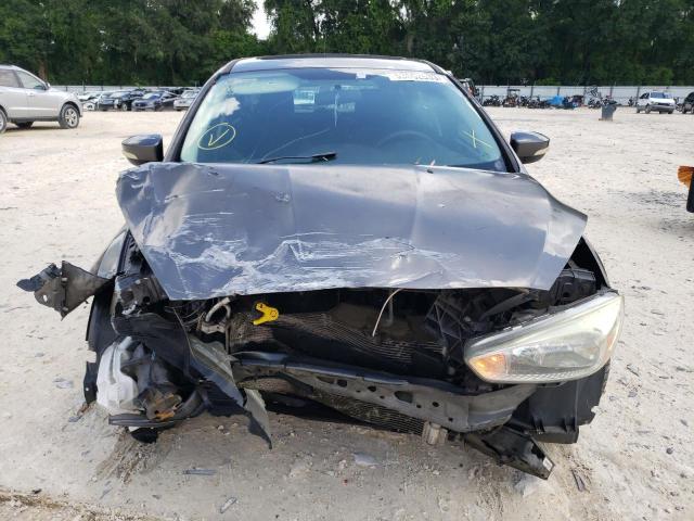 Foto 5 de la subasta – 2015 FORD FOCUS SE con VIN 1FADP3K29FL238830