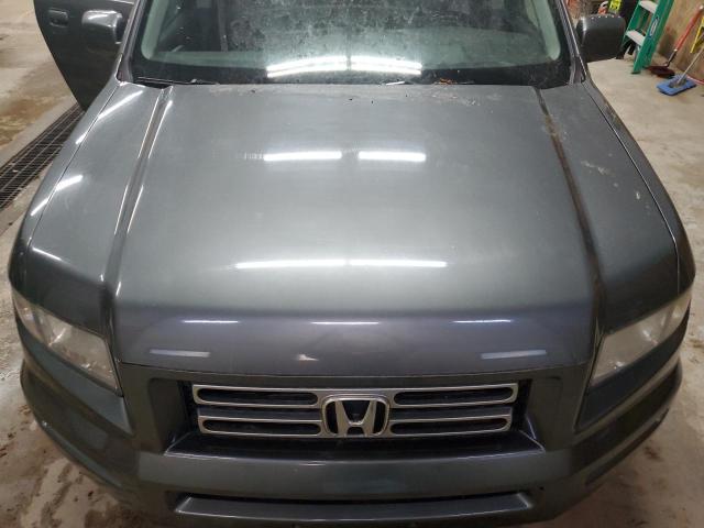 Photo 11 from auction – 2007 HONDA RIDGELINE with VIN 2HJYK16517H504726