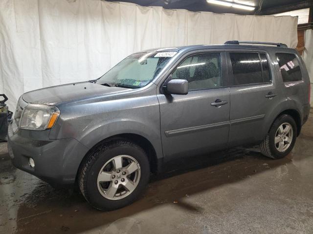 HONDA PILOT EXL 2011 with VIN 5FNYF4H56BB095922 - Photo from auction