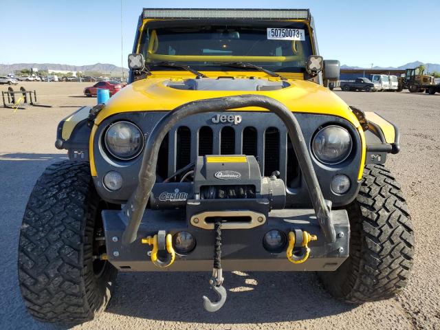 Photo 5 from auction – 2015 JEEP WRANGLER U with VIN 1C4BJWFG2FL619154
