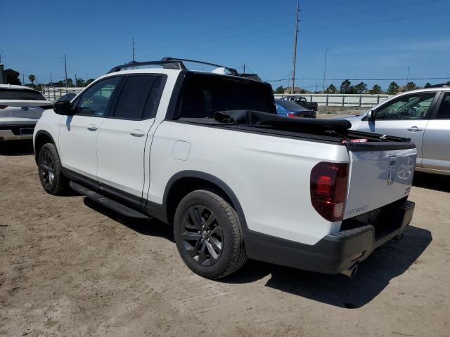 Photo 2 from auction – 2021 HONDA RIDGELINE with VIN 5FPYK3F18MB000552