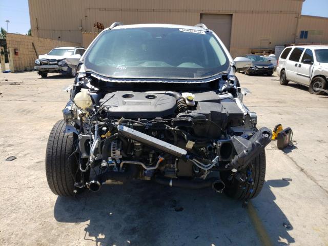 Photo 5 from auction – 2019 FORD ESCAPE TIT with VIN 1FMCU9J99KUC03401