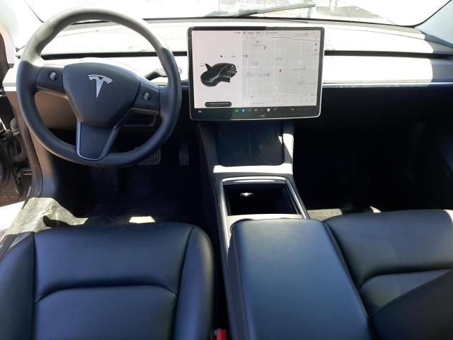 Photo 8 from auction – 2021 TESLA MODEL 3 with VIN 5YJ3E1EA0MF875981