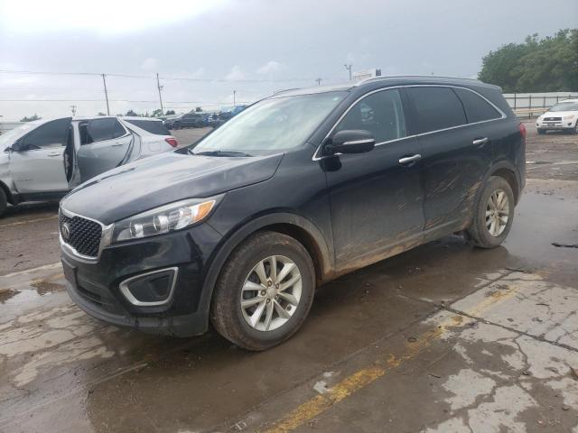 KIA SORENTO LX 2016 with VIN 5XYPG4A33GG090484 - Photo from auction
