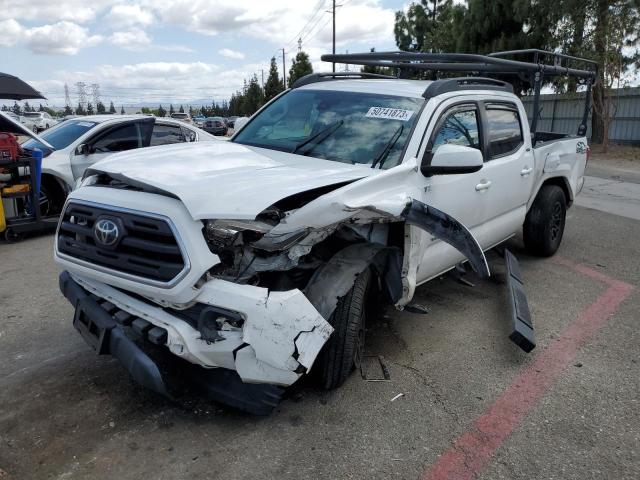 TOYOTA TACOMA DOU 2018 with VIN 3TMBZ5DN2JM016975 - Photo from auction