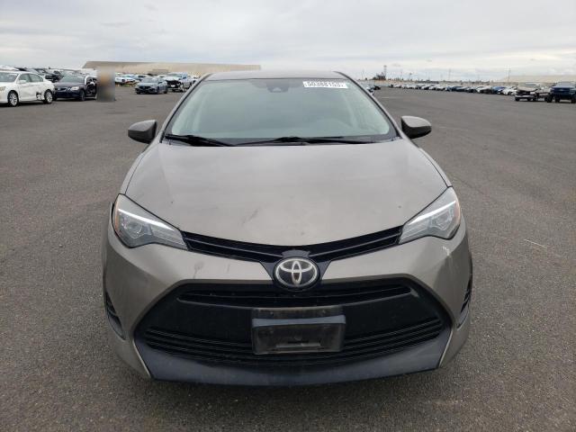 Photo 5 from auction – 2017 TOYOTA COROLLA L with VIN 5YFBURHE2HP690806