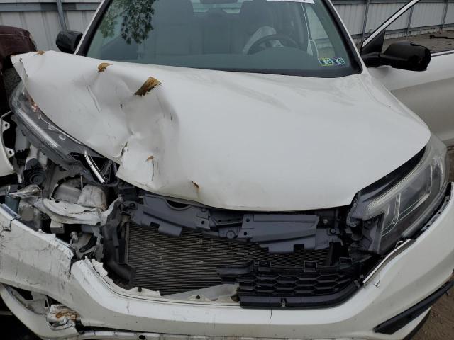 Photo 11 from auction – 2015 HONDA CR-V LX with VIN 5J6RM4H33FL016406