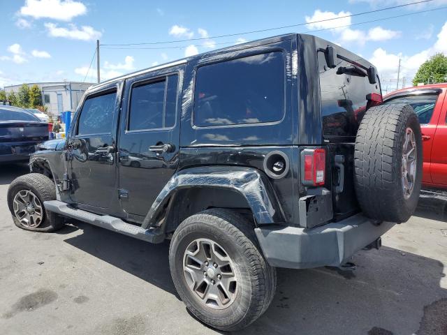 Photo 2 from auction – 2014 JEEP WRANGLER U with VIN 1C4HJWFG0EL134150