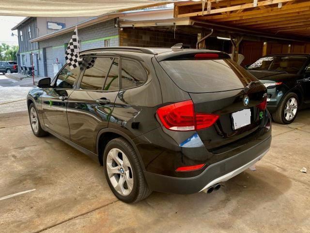Photo 3 from auction – 2014 BMW X1 SDRIVE2 with VIN WBAVM1C55EVW47833