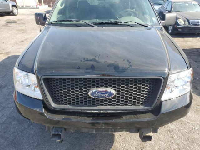 Photo 11 from auction – 2004 FORD F150 with VIN 1FTRX02W44KD29556