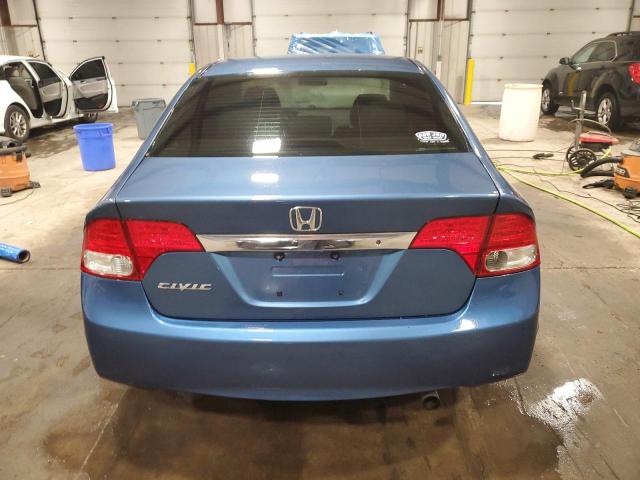 Photo 6 from auction – 2011 HONDA CIVIC LX with VIN 19XFA1F59BE032858