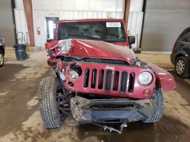 Photo 5 from auction – 2011 JEEP WRANGLER U with VIN 1J4BA5H14BL529737