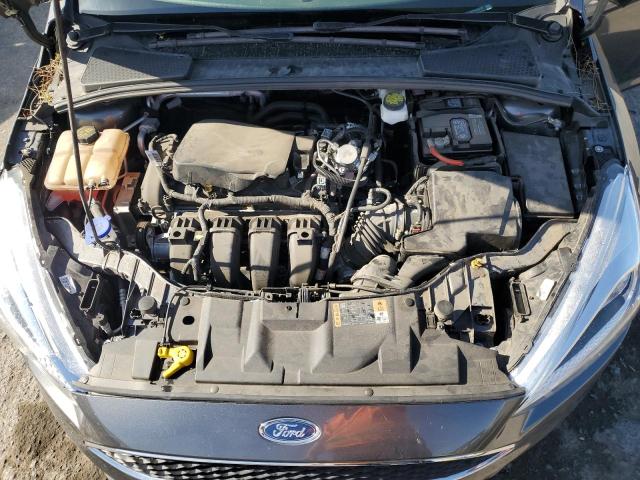Photo 11 from auction – 2018 FORD FOCUS S with VIN 1FADP3E28JL304787