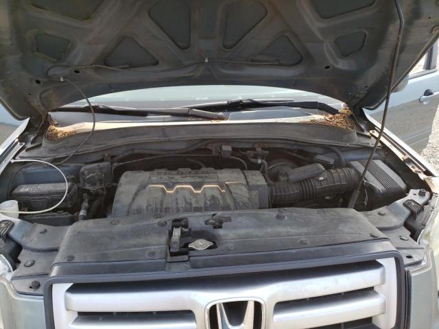 Photo 12 from auction – 2006 HONDA PILOT EX with VIN 2HKYF18536H536718