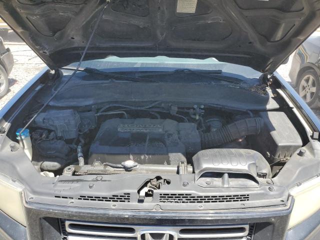 Photo 11 from auction – 2007 HONDA RIDGELINE with VIN 2HJYK16467H502221