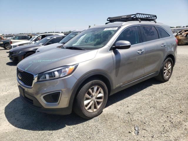 KIA SORENTO LX 2016 with VIN 5XYPGDA58GG178058 - Photo from auction