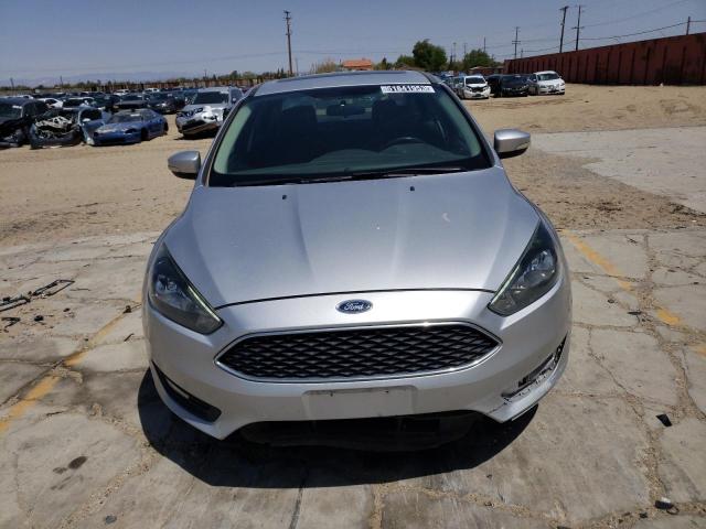 Photo 5 from auction – 2016 FORD FOCUS SE with VIN 1FADP3F27GL286029