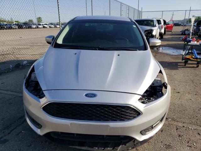 Photo 5 from auction – 2015 FORD FOCUS SE with VIN 1FADP3F20FL297758