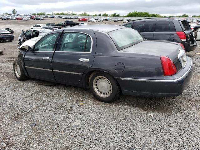 Photo 2 from auction – 2001 LINCOLN TOWN CAR E with VIN 1LNHM81W81Y632512