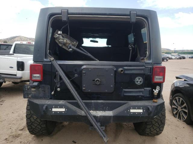 Foto 6 de la subasta – 2011 JEEP WRANGLER U con VIN 1J4BA5H16BL522336