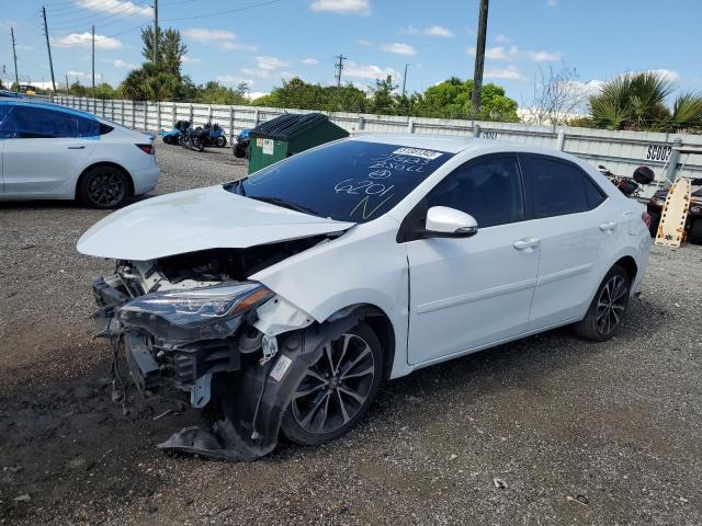 TOYOTA COROLLA L 2017 with VIN 5YFBURHE2HP596201 - Photo from auction