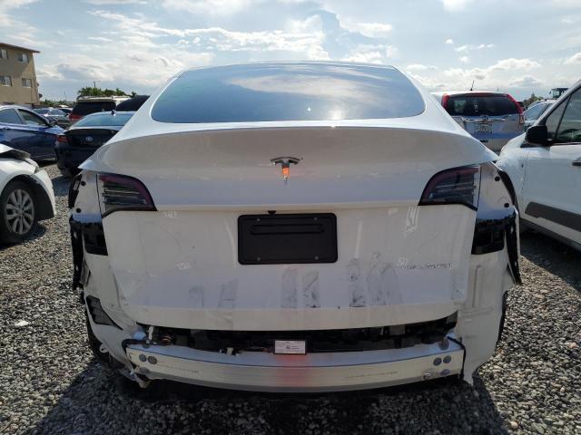 Photo 6 from auction – 2023 TESLA MODEL Y with VIN 7SAYGDEE8PF606395
