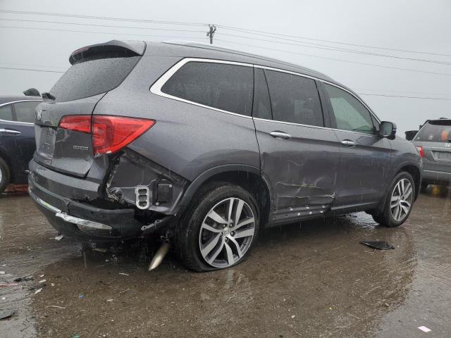 Photo 3 from auction – 2018 HONDA PILOT TOUR with VIN 5FNYF5H93JB023504