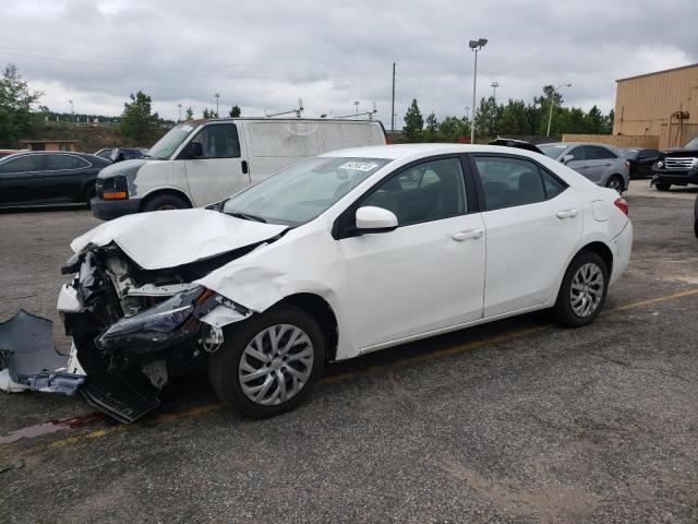 TOYOTA COROLLA 2018 with VIN 5YFBURHE4JP771425 - Photo from auction
