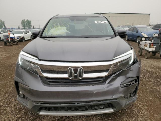 Photo 5 from auction – 2021 HONDA PILOT BLAC with VIN 5FNYF6H78MB503871