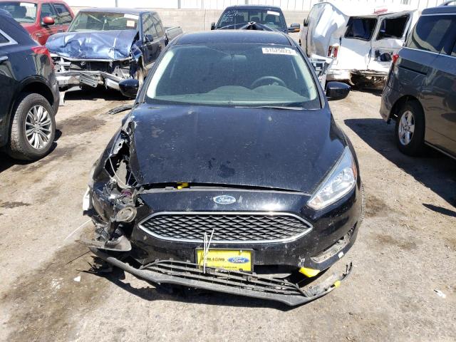 Photo 5 from auction – 2018 FORD FOCUS SE with VIN 1FADP3FE5JL244525