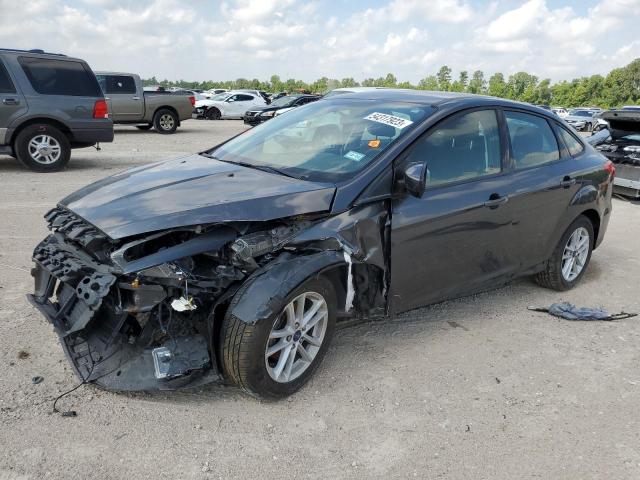 FORD FOCUS SE 2018 with VIN 1FADP3F28JL203876 - Photo from auction