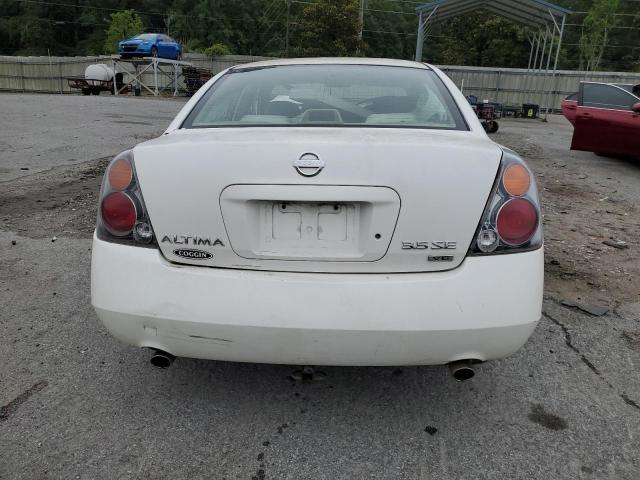 Photo 6 from auction – 2002 NISSAN ALTIMA with VIN 1N4BL11D12C234260