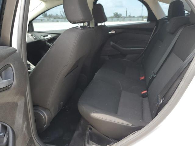 Foto 10 de la subasta – 2017 FORD FOCUS SE con VIN 1FADP3F24HL331221