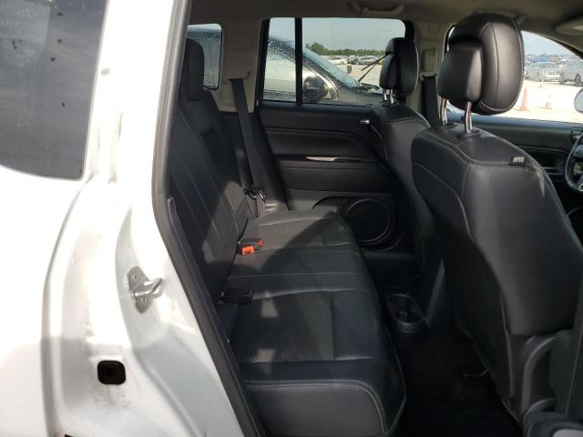 Photo 11 from auction – 2014 JEEP COMPASS LA with VIN 1C4NJCEB7ED628572