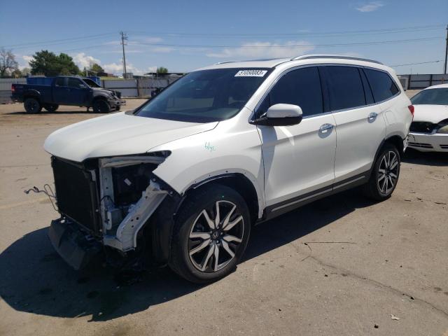 HONDA PILOT TOUR 2019 with VIN 5FNYF6H66KB016785 - Photo from auction