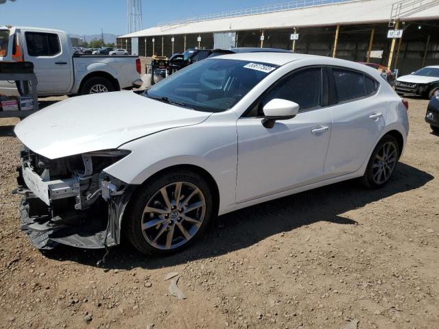 MAZDA 3 TOURING 2018 with VIN 3MZBN1L37JM165710 - Photo from auction
