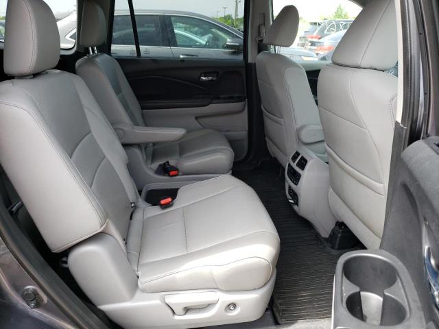 Photo 11 from auction – 2018 HONDA PILOT ELIT with VIN 5FNYF6H09JB067417