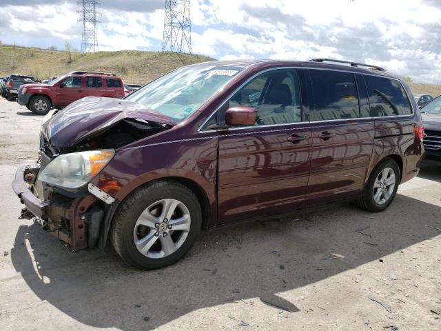 HONDA ODYSSEY TO 2010 with VIN 5FNRL3H95AB033694 - Photo from auction