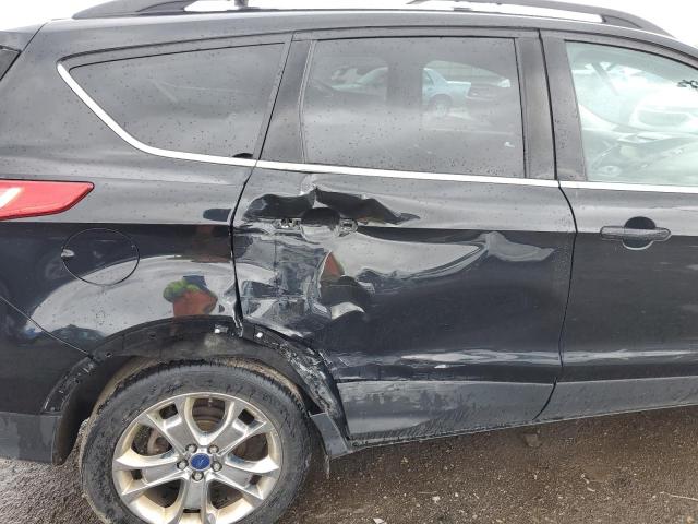 Photo 10 from auction – 2014 FORD ESCAPE SE with VIN 1FMCU0GX5EUA76328