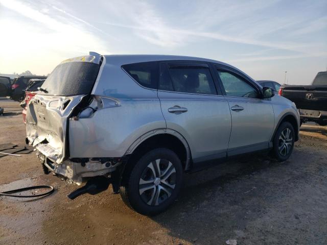 Photo 3 from auction – 2018 TOYOTA RAV4 LE with VIN 2T3ZFREV2JW519711