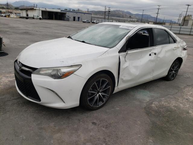 TOYOTA CAMRY LE 2016 with VIN 4T1BF1FKXGU197697 - Photo from auction